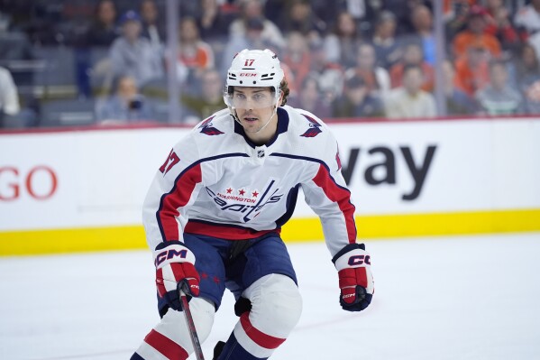 FILE - Washington Capitals' Dylan Strome plays during an NHL hockey game, Tuesday, April 16, 2024, in Philadelphia. Since being picked third in the draft nearly a decade ago behind Connor McDavid and Jack Eichel and ahead of Mitch Marner, Dylan Strome has yet to play in an NHL playoff game outside the 2020 pandemic bubble. That changes Sunday when he and the Washington Capitals visit the New York Rangers, fittingly at Madison Square Garden where he rooted on his brother Ryan in the 2022 postseason.(AP Photo/Matt Slocum, File)