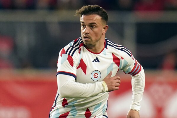 FILE - Chicago Fire midfielder Xherdan Shaqiri (10) runs during an MLS soccer match against the New York Red Bulls, Saturday, April 13, 2024 in Harrison, N.J. (AP Photo/Vera Nieuwenhuis, File)