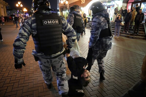 FILE - Riot police detain a demonstrator during a protest against mobilization in Moscow on Wednesday, Sept. 21, 2022. (AP Photo, File)