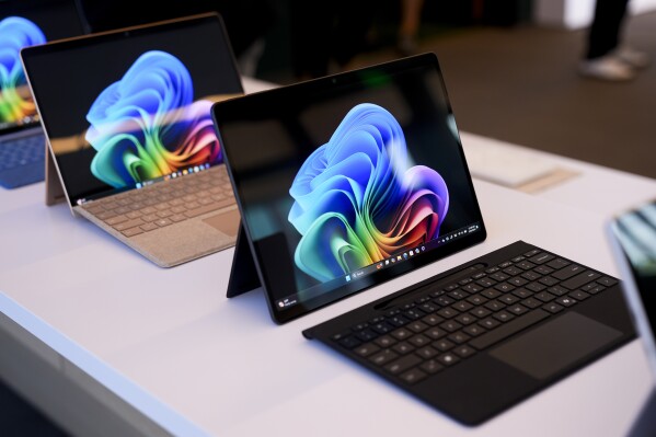 Microsoft Surface Pro devices are displayed in a demo room following a showcase event of the company's AI assistant Copilot ahead of the annual Build developer conference at Microsoft headquarters, Monday, May 20, 2024, in Redmond, Wash. (AP Photo/Lindsey Wasson)
