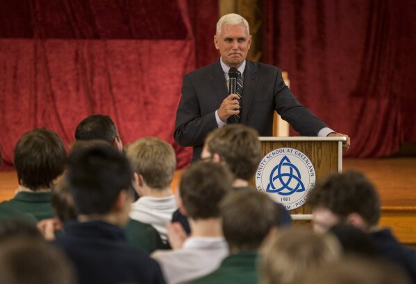 FILE - In this April 2, 2014, file photo, then-Indiana Gov. Mike Pence, speaks at Trinity School at Greenlawn on Wednesday, April 2, 2014, in South Bend, Ind. (Robert Franklin/South Bend Tribune via AP)/South Bend Tribune via AP)