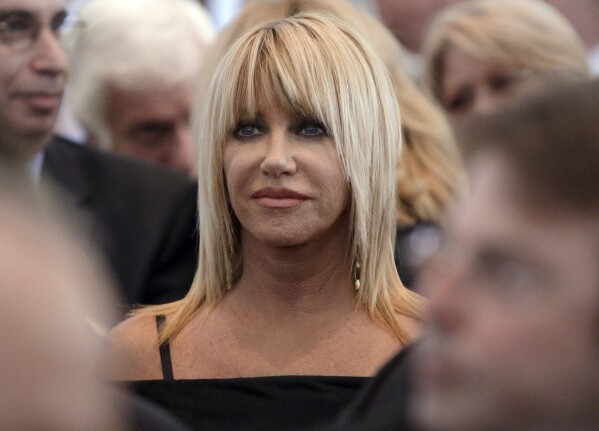 FILE - Suzanne Somers is seen during the funeral services for Merv Griffin at the Church of the Good Shepherd in Beverly Hills, Calif., Aug. 17, 2007. Somers, the effervescent blonde actor known for playing Chrissy Snow on the television show “Three’s Company,” as well as her business endeavors, died early Sunday, Oct. 15, 2023, her family said in a statement provided by her longtime publicist R. Couri Hay. She was 76. (AP Photo/Kevork Djansezian, Pool, File)
