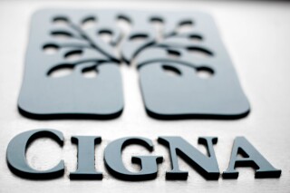 FILE - This photo shows the Cigna logo at the headquarters of the health insurer Cigna Corp., in Philadelphia on Aug 4, 2011. A federal lawsuit alleges that the health insurance giant used a computer algorithm to automatically reject hundreds of thousands of patient claims without examining them individually as required by California law. The class-action suit filed Monday, July 24, 2023, says Cigna rejected more than 300,000 payment claims in just two months last year. (AP Photo/Matt Rourke, File)
