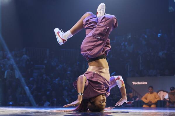 FILE - Logan Edra, also known as B-Girl Logistx, of the United States competes in the B-girl Red Bull BC One World Final at Hammerstein Ballroom on Saturday, Nov. 12, 2022, in Manhattan, New York. Breakdancing will make its debut as an Olympic sport at the 2024 Paris Olympics. (AP Photo/Andres Kudacki)