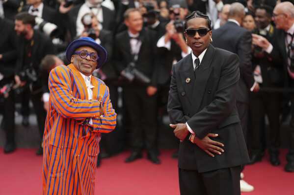Director Spike Lee, from left, and A$AP Rocky pose for photographers upon arrival at the premiere of the film 'Highest 2 Lowest' at the 78th international film festival, Cannes, southern France, Monday, May 19, 2025. (Photo by Lewis Joly/Invision/AP)