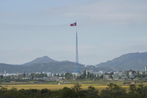 FILE - A North Korean flag flutters in the wind near the border villages of Panmunjom in Paju, South Korea on Oct. 4, 2022. South Korea says Friday, Oct. 28, 2022, North Korea has fired a ballistic missile toward its eastern waters. (AP Photo/Ahn Young-joon, File)