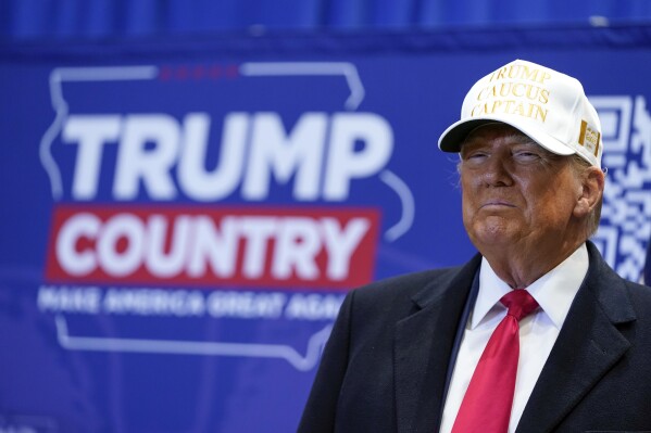 Republican presidential candidate former President Donald Trump arrives to speak at a rally at Simpson College in Indianola, Iowa, Sunday, Jan. 14, 2024. (AP Photo/Andrew Harnik)