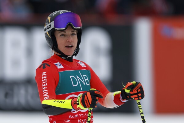 Switzerland's Lara Gut Behrami checks her time at the finish area of an alpine ski, women's APCup super-G race, in Kvitfjell, Norway, Saturday, March 2, 2024. (APPhoto/Alessandro Trovati)