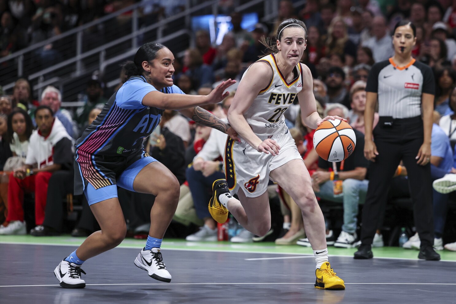 Natasha Howard scores 26 and Fever beat Dream 81-76 despite Caitlin Clark not making a 3