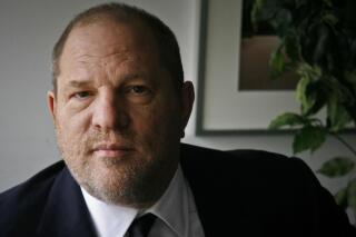 FILE - In this Nov. 23, 2011 file photo, film producer Harvey Weinstein poses for a photo in New York. Six women filed a federal lawsuit against Weinstein on Wednesday, Dec. 6, 2017, claiming that the movie mogul's actions to cover up assaults amounted to civil racketeering. (AP Photo/John Carucci, File)
