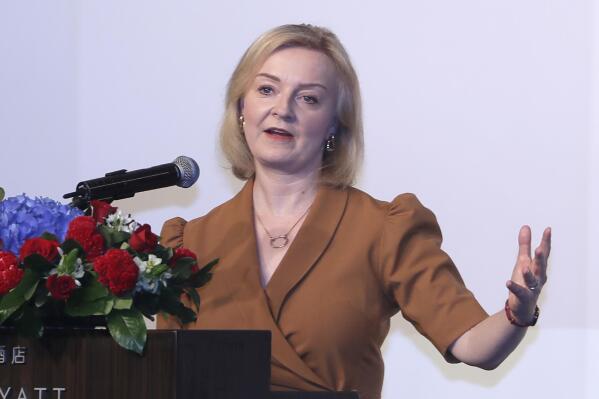 Former Britain's Prime Minister Liz Truss delivers a speech on the second day of her five-day visit in Taipei, Taiwan, Wednesday, May 17, 2023. (AP Photo/ Chiang Ying-ying)