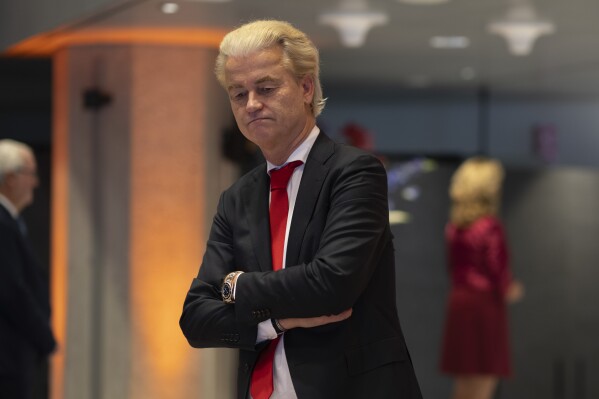 Geert Wilders, leader of the far-right party PVV, or Party for Freedom, waits for the start of a meeting with speaker of the House Vera Bergkamp, two days after Wilders won the most votes in a general election, in The Hague, Netherlands, Friday Nov. 24, 2023. (AP Photo/Peter Dejong)