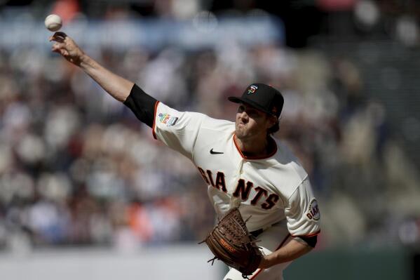 San Francisco Giants starting pitcher Kevin Gausman throws during the first inning of the team's baseball game against the Chicago Cubs on Saturday, June 5, 2021, in San Francisco. (AP Photo/Scot Tucker)