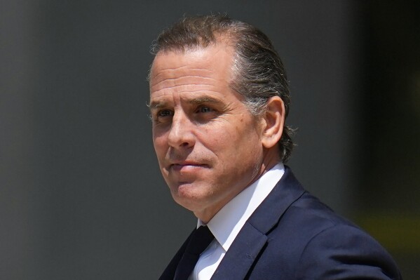FILE - President Joe Biden's son, Hunter Biden, leaves after a court appearance, July 26, 2023, in Wilmington, Del. Hunter Biden has asked a judge to approve subpoenas for documents from Donald Trump and former Justice Department officials related to whether political pressure wrongly influenced the criminal case against him. Defense attorneys for President Joe Biden’s son say Trump pressured the Justice Department to investigate and prosecute him to bolster the Republican's own political fortunes. (AP Photo/Julio Cortez, File)