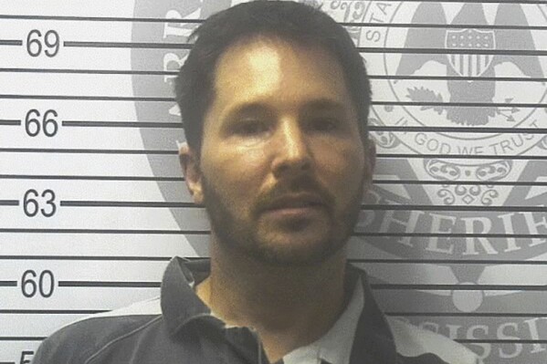 This September 2023 Harrison County Adult Detention Center booking photograph provided by the Harrison County Sheriff's Office shows City of Biloxi Councilman Robert Leon Deming, III, in Gulfport, Miss. On Friday, May 3, 2024, prosecutors said the Mississippi city councilman pleaded guilty to federal charges after running a multimillion-dollar illegal drug business. (Harrison County Adult Detention Center via AP)
