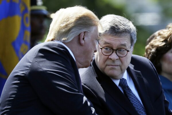 FILE - In this May 15, 2019 file photo, President Donald Trump and Attorney General William Barr attend the 38th Annual National Peace Officers' Memorial Service at the U.S. Capitol in Washington. The House Judiciary Committee is launching a wide-ranging probe of Attorney General William Barr and the Justice Department, demanding briefings, documents and interviews with 15 officials about whether there has been improper political interference in federal law enforcement. (AP Photo/Evan Vucci)