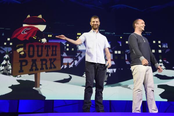 FILE- In this June 15, 2015, file photo, "South Park" creators Matt Stone, left, and Trey Parker discuss the "South Park: The Fractured But Whole" video game onstage at Ubisoft's E3 2015 Conference at the Orpheum Theatre in Los Angeles. In an interview with Colorado Gov. Jared Polis, Friday, Aug. 13, 2021, Stone and Parker said they had come to an agreement with the current owners of the Casa-Bonita restaurant that was featured on the show. The suburban Denver restaurant had closed to diners in March 2020 due to the pandemic and declared bankruptcy in the spring. (Photo by Chris Pizzello/Invision/AP, File)