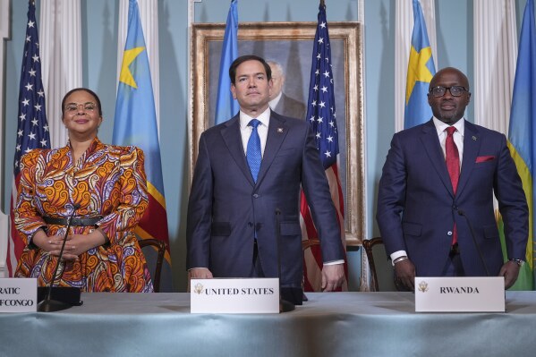 Secretary of State Marco Rubio hosts a signing ceremony in which Congo's Foreign Minister Therese Kayikwamba Wagner, left, and Rwanda's Foreign Minister Olivier Nduhungirehe, right, pledge to work toward a peace deal on Friday, April 25, 2025, at the State Department in Washington. (AP Photo/Jacquelyn Martin, File)