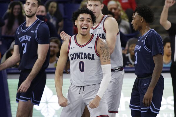Gonzaga guard Julian Strawther celebrates his basket during the second half of an NCAA college basketball game against San Diego in Spokane, Wash., Saturday, Feb. 20, 2021. (AP Photo/Young Kwak)