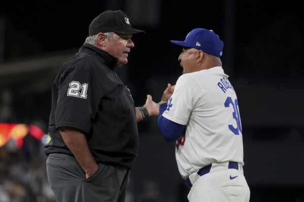 Dodgers' Dave Roberts ejected in 6th after interference call at third base  | AP News