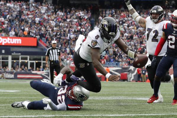 Jackson accounts for 5 TDs, Ravens hold off Patriots 37-26