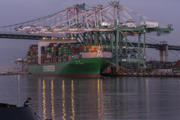 The container ship Ever Libra (TW) is moored at the Port of Los Angeles on Monday, Nov. 21, 2022. The supply backlogs of the past two years -- and the delays, shortages and outrageous prices they brought with them -- have improved dramatically since summer. (AP Photo/Damian Dovarganes)