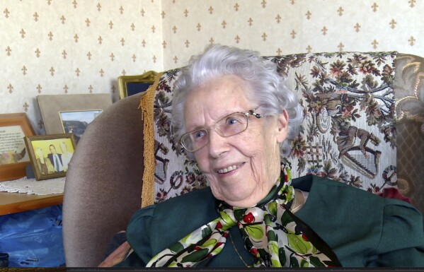 This image taken from family video in June 2015, shows Maureen Sweeney. Sweeney was a postal clerk at Blacksod Point on the northwest coast of Ireland, where one of her duties was to record data that fed into weather forecasts for the British Isles. In early June 1944, Sweeney sent a series of readings that helped persuade Gen. Dwight D. Eisenhower, the supreme commander of Allied forces in Europe, to delay D-Day and avoid potentially disastrous weather that could have wrecked the landings. She didn’t learn of her role in history for more than 10 years. (Fergus Sweeney/Family Handout via AP)