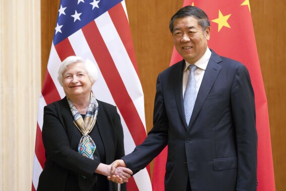 FILE - Treasury Secretary Janet Yellen, left, shakes hands with Chinese Vice Premier He Lifeng during a meeting at the Diaoyutai State Guesthouse in Beijing, China, July 8, 2023. The U.S. Treasury Department and China's Ministry of Finance launched a pair of economic working groups on Friday in an effort to ease tensions and deepen ties between the nations. (AP Photo/Mark Schiefelbein, Pool, File)
