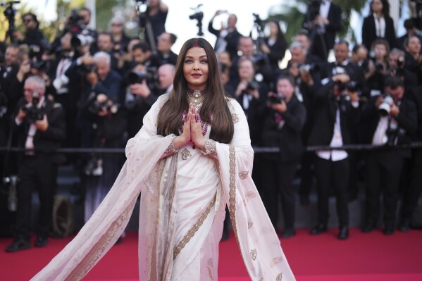Aishwarya Rai Bachchan poses for photographers upon arrival at the premiere of the film 'The History of Sound' at the 78th international film festival, Cannes, southern France, Wednesday, May 21, 2025. (Photo by Lewis Joly/Invision/AP)