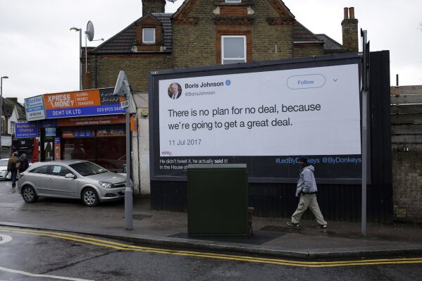 
              ADVANCE FOR PUBLICATION ON SUNDAY, FEB. 17, AND THEREAFTER - A billboard is displayed as part of the campaign for Britain to remain in the European Union, by the  "Led By Donkeys" group, which aims to highlight quotes on Brexit made by politicians and organizations and displayed on billboards in London, in this photo dated Friday, Feb. 8, 2019.  The British and Irish leaders were meeting Friday to discuss the Irish border, and mend fences, amid rising tensions between Britain and the European Union over Brexit.  Four friends have recently started posting quotes and Tweets by pro-Brexit politicians to highlight what the group see as their hypocrisy, dubbing their billboard campaign “Led by Donkeys,”.(AP Photo/Matt Dunham)
            