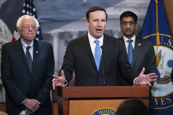 Sen. Bernie Sanders, I-Vt., from left, Sen. Chris Murphy, D-Conn., and Rep. Ro Khanna, D-Calif., speak to reporters on Capitol Hill in Washington, April 4, 2019. (AP Photo/J. Scott Applewhite, File)