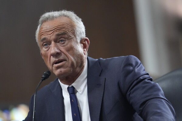 Robert F. Kennedy Jr., President Donald Trump's choice to be Secretary of Health and Human Services, appears before the Senate Finance Committee for his confirmation hearing at the Capitol in Washington, Wednesday, Jan. 29, 2025. (AP Photo/J. Scott Applewhite)