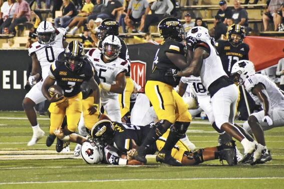 Southern Mississippi running back Frank Gore Jr. breaks a tackle against Arkansas State during an NCAA college football game in Hattiesburg, Miss. on Saturday, Oct. 15, 2022. (Aimee Cronan/The Gazebo Gazette via AP)