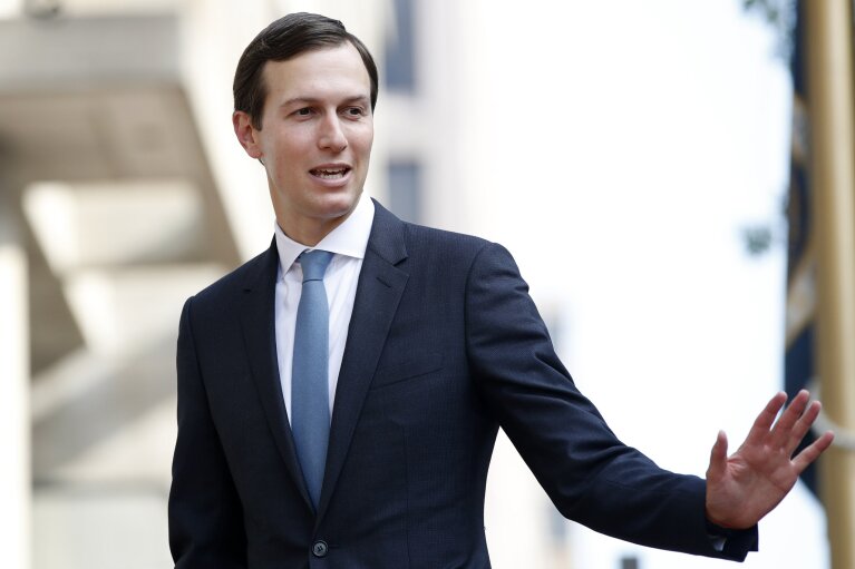 FILE - In this Aug. 29, 2018, file photo, White House Adviser Jared Kushner waves as he arrives at the Office of the United States Trade Representative in Washington. 