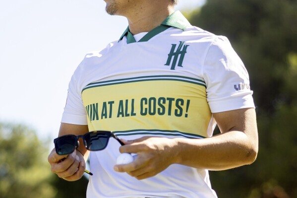 Jinichiro Kozuma of Iron Heads GC waits on the 18th hole during the practice round for LIV Golf Adelaide at the Grange Golf Club Thursday, April 25, 2024, in Adelaide, Australia. (Chris Trotman/LIV Golf via AP)