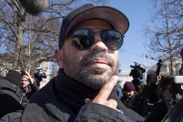 Former Proud Boys leader Enrique Tarrio attends a news conference outside the U.S. Capitol in Washington, Feb. 21, 2025. (AP Photo/J. Scott Applewhite, File)