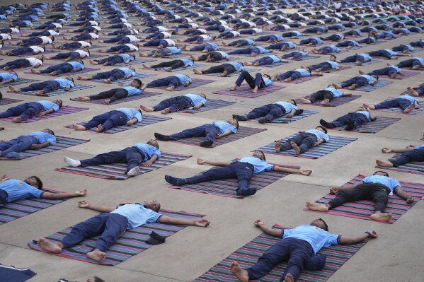 National Cadet Corps cadets practice Yoga ahead of International Day of Yoga in Ahmedabad, India, Friday, June 20, 2025. (AP Photo/Ajit Solanki)