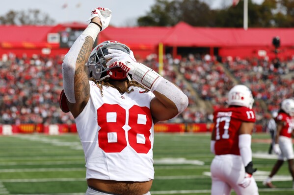 Ohio State tight end Gee Scott Jr. (88) reacts after scoring a touchdown against Rutgers during the first half of a NCAA college football game, Saturday, Nov. 4, 2023, in Piscataway, N.J. (AP Photo/Noah K. Murray)