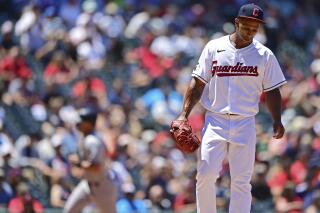 Cleveland Guardians relief pitcher Anthony Gose waits for New York Yankees' Matt Carpenter to run the bases after hitting a two-run home run in the sixth inning in the first baseball game of a doubleheader, Saturday, July 2, 2022, in Cleveland. (AP Photo/David Dermer)