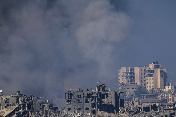 Smoke rises after an Israeli strike on the Gaza Strip on Saturday, Nov. 18, 2023. (AP Photo/Ariel Schalit)