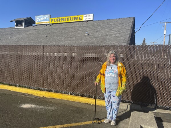 This image provided by the Oregon Law Center shows Janine Harris, a homeless plaintiff in a new lawsuit against the Oregon city of Grants Pass over its homeless camping regulations, in Grants Pass, Ore., on Jan. 29, 2025. (Ali Mayeda/Oregon Law Center via AP)
