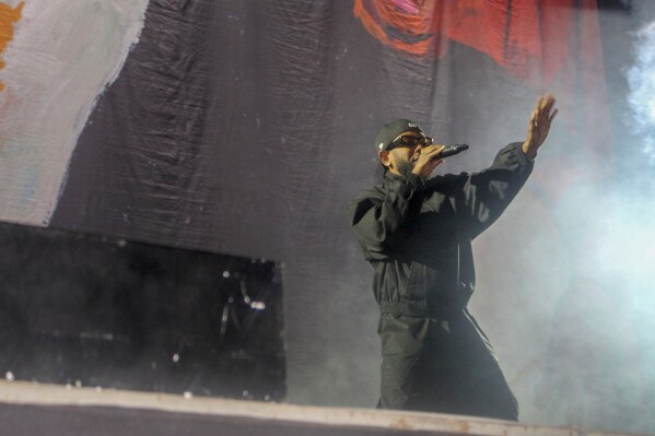 Grammy award-winning rapper Kendrick Lamar performs at the inaugural Hey Neighbour Festival in Pretoria, South Africa, Saturday, Dec. 9, 2023. (AP Photo/Mogomotsi Magome)