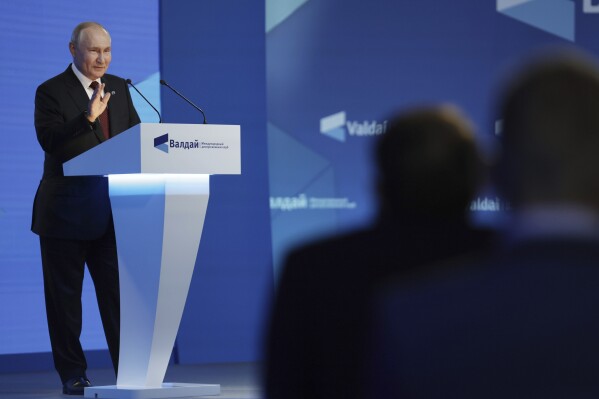 Russian President Vladimir Putin addersses the annual meeting of the Valdai Discussion Club in the Black Sea resort of Sochi, Russia, Thursday, Oct. 5, 2023. (Vladimir Smirnov, Sputnik, Kremlin Pool Photo via AP)