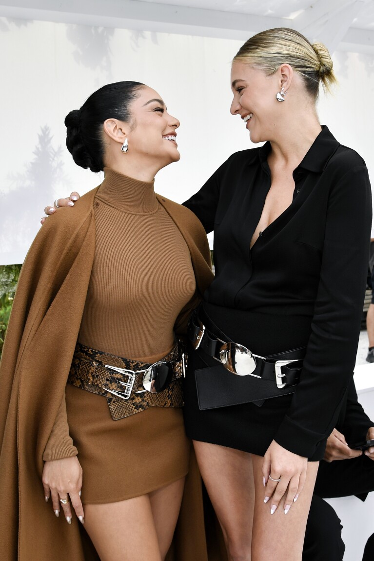 Vanessa Hudgens, left, and Kelsea Ballerini attend the Michael Kors Spring/Summer 2024 fashion show as part of New York Fashion Week ...