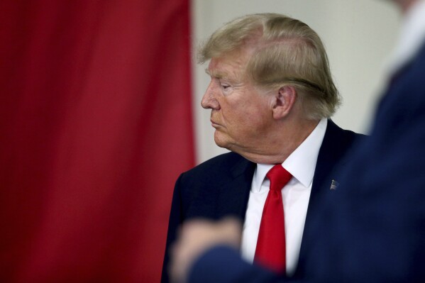 Republican presidential candidate and former President Donald Trump speaks to Texas state troopers and guardsmen at the South Texas International Airport, Sunday, Nov. 19, 2023, in Edinburg, Texas. (Delcia Lopez/The Monitor via AP, Pool)