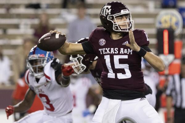Texas A&M Aggies quarterback Conner Weigman (15) throws a pass during the first half of an NCAA college football game Saturday, Oct. 29, 2022, in College Station, Texas. (Logan Hannigan-Downs/College Station Eagle via AP)