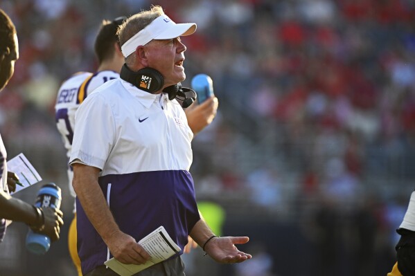 LSU coach Brian Kelly reacts during the first half of the team's NCAA college football game against Mississippi in Oxford, Miss., Saturday, Sept. 30, 2023. (AP Photo/Thomas Graning)