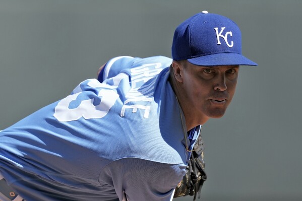 Kansas City Royals starting pitcher Zack Greinke throws during the first inning of a baseball game against the Cleveland Guardians Wednesday, Sept. 20, 2023, in Kansas City, Mo. (AP Photo/Charlie Riedel)