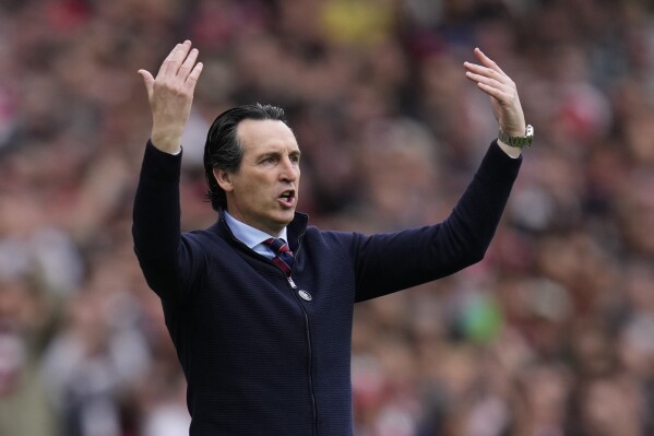 Aston Villa's head coach Unai Emery gestures during the English Premier League soccer match between Arsenal and Aston Villa at the Emirates stadium in London, Sunday, April 14, 2024. (AP Photo/Kirsty Wigglesworth)