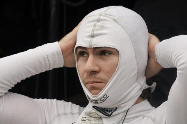 FILE - Colton Herta prepares to drive during a practice session for the IndyCar auto race at Indianapolis Motor Speedway, Friday, Aug. 13, 2021, in Indianapolis. The IndyCar Series opens its season this weekend on the downtown streets of St. Petersburg, Florida.  Colton Herta is the defending race winner. IndyCar is on a high as it begins its season with young talent capable of carrying the series into the future. But Herta is again in the mix of Formula One conversations and Pato O’Ward already has one foot out the door. (AP Photo/Darron Cummings, File)